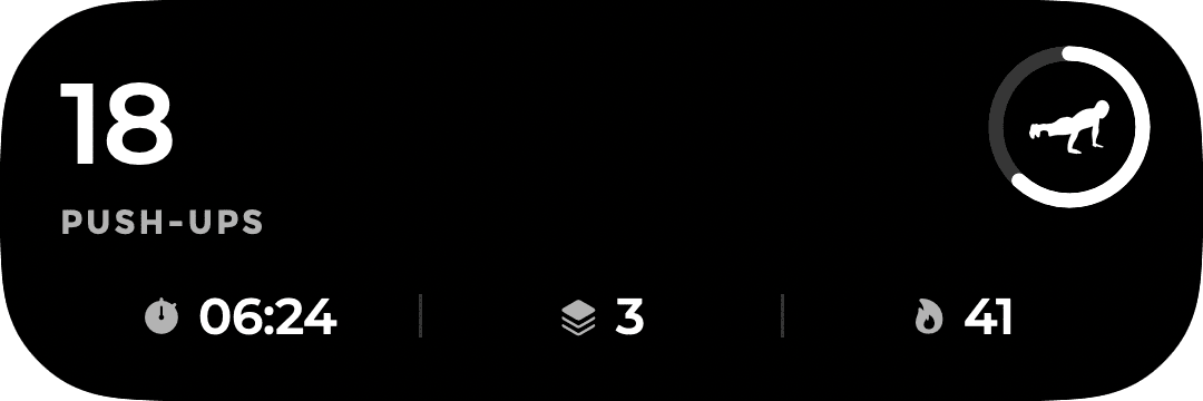 The expanded Dynamic Island: 18 push-ups on the left, a goal ring on the right, and a bottom strip with time, sets and calories
