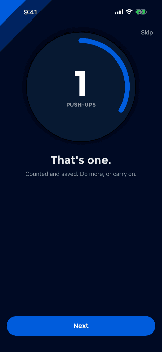 The same screen after one rep, now reading one push-up under the words That's one